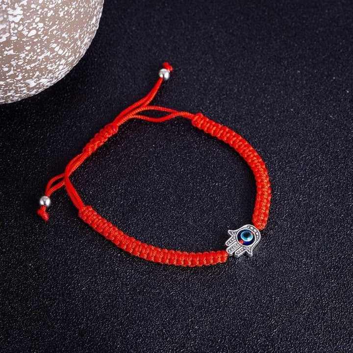 Hamsa Hand Red Cord Bracelet - A Talisman Against Ill Fortune and Disease